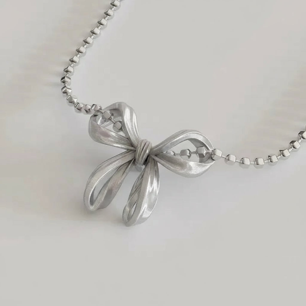 Silver Cylinder-shaped Beaded Chain with Butterfly Bowkont Charm Pendant